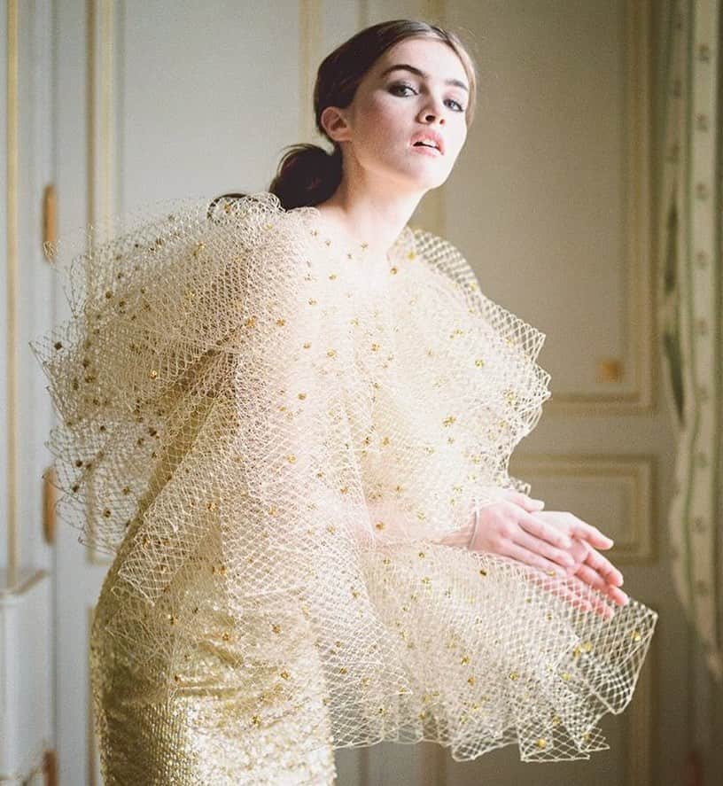 アレクシマビーユのインスタグラム：「A cloud of spring sun @alexismabille pale gold haute couture look @ritzparis shot @clairemorrisphotography #palegold #goldfever #tulle #voilette #sequins #goldlook #poetry #transparency #delicacy #ruffles #golddress #goldbolero #alexismabille #ritzparis #alexismabillehautecouture #hautecouture #comingsoon #ondemand #bespoke #bymesure #gold&chic #cacestparis」