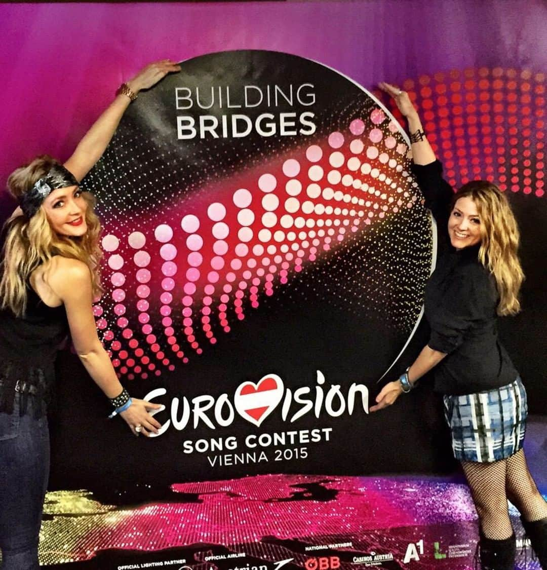 ジュリアナ・デヴァーさんのインスタグラム写真 - (ジュリアナ・デヴァーInstagram)「That time my friend @jennigan1 and I attended #Eurovision live and in person.⁣ ⁣ If you're a 🌈Eurovision fan, the pain is real today.⁣ ⁣ What would have been the actual competition finals tonight is not a reality. #coronavirussucks⁣ ⁣ No costume changes, no pyrotechnics, no backup dancers, no people pretending to play instruments, NO KEY CHANGES 😱. Damn it, where will I go to drench my tympanic membranes in all of those sweet, sweet key changes?⁣ ⁣ Deep down, the thing I love most about that bonkers Eurolicious song contest is the unity.⁣ ⁣ I'm not gonna lie, in 2010 when Madcon did that Glow flash mob around the world, I cried through the whole thing. We were watching it in the USA at noon. "People are amazing!" I would say to hubs, tears falling into my malbec.⁣ ⁣ (why was I drinking a malbec at noon while watching the show? Actually...that doesn't seem very odd anymore. *pulls cork out of a chardonnay*)⁣ ⁣ I digress...⁣ ⁣ All this is to say, I freakin love Eurovision, and I miss it and I'm sorry Iceland didn't win today. But also...I will also give my 𝗱𝗼𝘂𝘇𝗲 𝗽𝗼𝗶𝗻𝘁𝘀 to Elnur and Samir from Azerbaijan ❤. ALWAYS⁣ ⁣ What's your favorite Eurovision act? If you're a fan, how you doin' today?」5月17日 2時46分 - cleverdeverwherever