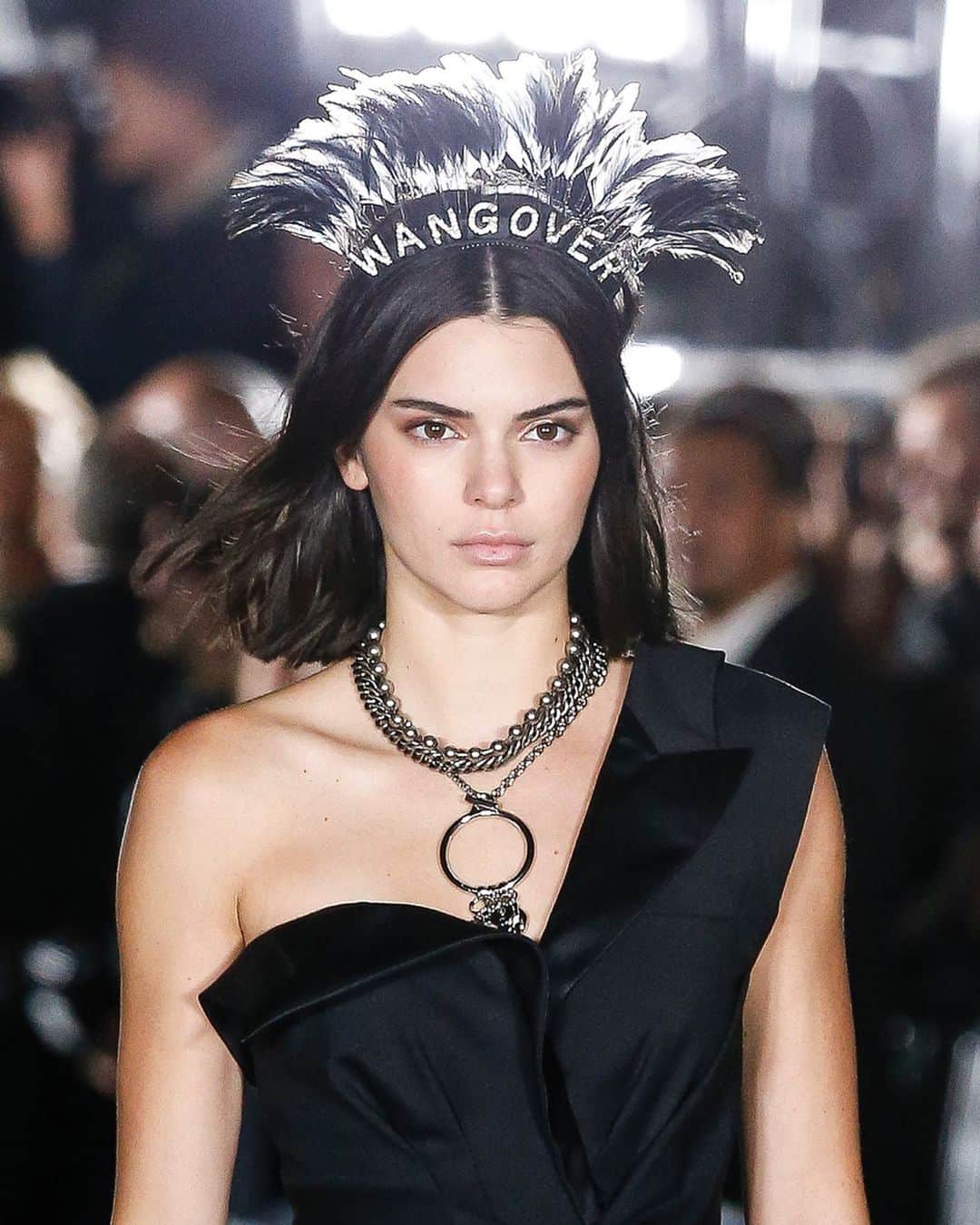 アレキサンダー・ワンのインスタグラム：「Remember When... @stephenjonesmillinery gave the party hat a Wangover?⁣⁣⁣⁣⁣⁣ ⁣ With a career spanning four decades, legendary milliner Stephen Jones has seen his designs become staples on magazine covers and runways alike. ⁣⁣⁣⁣⁣ ⁣ For SS18, Jones created custom headpieces worn by @kendalljenner, @bellahadid, @annaewers and @catmcneil as we took it to the streets for #Wangfest. ⁣⁣⁣⁣⁣⁣ ⁣ “I had a great meeting with Alexander in my Covent Garden studio. It was interesting because Alexander was initially inspired by me and my time with the Blitz Kids, so for me to then have to design around that, I created these feather party tiaras. It was a surreal process!” – Stephen Jones」