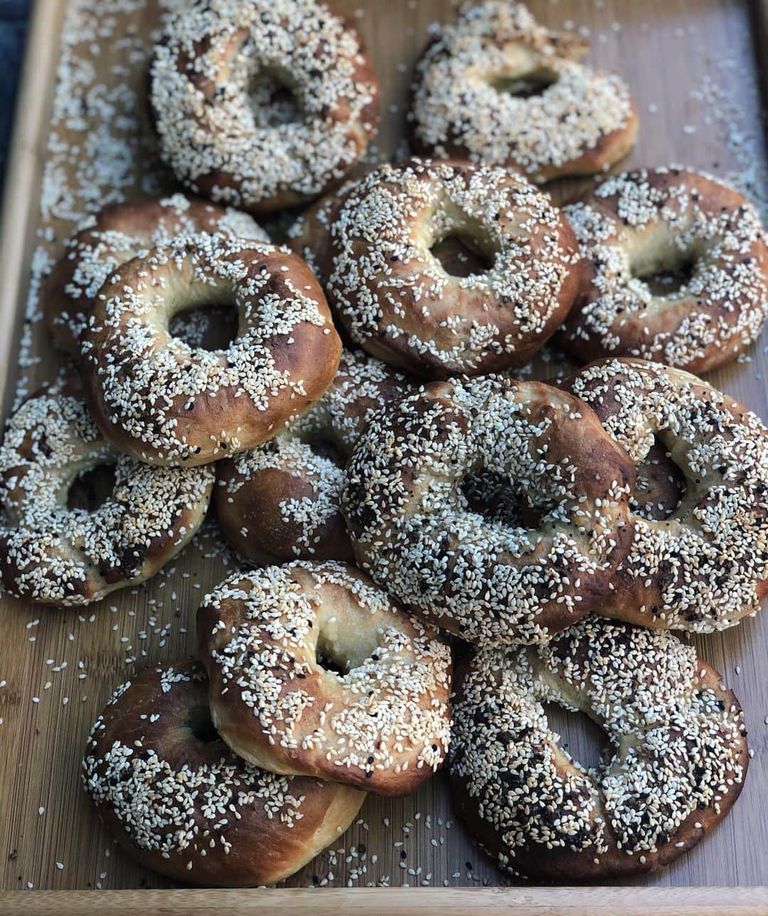 Antonietteのインスタグラム：「Bagels are my everything! 🥯 Especially served with schmear, lox, capers and red onion, which I didn’t have, but the crisp of the cucumber will do! Montreal style bagels (thinner and sweeter) are my fave! Shown in my highlights, this recipe from @thewoksoflife has me feeling like I’m walking down the cobblestone street of Rue Ste-Paul when I’m really just walking on the artificial turf in my backyard. 😆 Make bagels one of this your ba-goals! #quarantinecuisine」