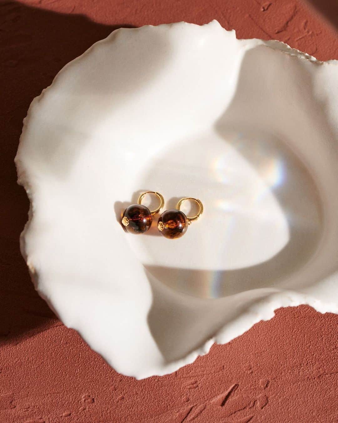 Club Monacoのインスタグラム：「Our trick to pulling it all together: The new Bead Drop earrings.」