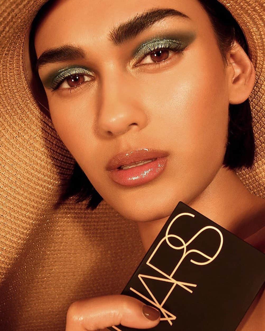 NARSさんのインスタグラム写真 - (NARSInstagram)「We've got our summer look on lock, thanks to NARS Senior Artist @clay_reid.  Photo: @martinjgirtley Hair: @nataliemealymakeup Model: @itsmayaansar Location: @n1gardencentre  Get the look: FACE Sheer Glow Foundation Tinted Glow Booster Radiant Creamy Concealer  Matte Bronzing Powder in Samoa Paradise Found Bronzing Powder Blush in Tempted  EYES Cool Crush Eyeshadow Palette in Inception and Ganges Powerchrome Loose Eye Pigment in Islamorada Climax Mascara  LIPS Precision Lip Liner in Hyères Oil-Infused Lip Tint in Reef」5月23日 4時16分 - narsissist