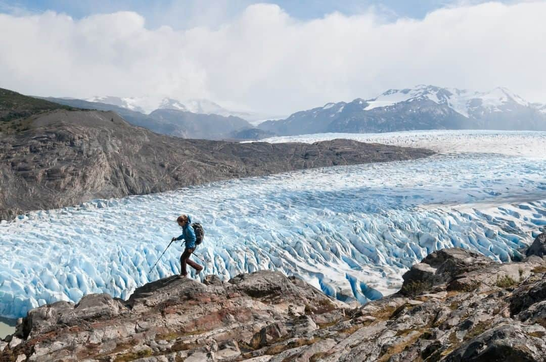 National Geographic Travelさんのインスタグラム写真 - (National Geographic TravelInstagram)「Photo by @michaelclarkphoto | Lydia McDonald hikes above the Grey Glacier on the eastern side of Torres del Paine National Park in southern Chile. I have visited Torres del Paine several times, and it is one of the most beautiful national parks in South America. This part of the trail is on the far side of the park, and it has an incredible view looking north up to the Patagonia Ice Cap. #glaciergrey #torresdelpaine #chile」5月24日 1時06分 - natgeotravel