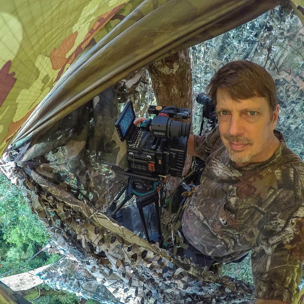 Tim Lamanさんのインスタグラム写真 - (Tim LamanInstagram)「From the archives, here’s a little glimpse into the glamour of wildlife photography… getting caught in a sudden downpour in Thailand while building a canopy platform to film hornbills near a fruiting fig tree.  Why didn’t I go down?  I decided to wait it out so I could finish the platform and blind and be ready to film there the next morning.  In the video you also see another canopy resident waiting out a rain shower on another day.  It’s a female Helmeted Hornbill in her nest cavity.  See my recent posts @TimLaman to learn more about Helmeted Hornbills.  Swipe to see a couple of other hornbill species I eventually got from this platform:  Photos 2) Rhinoceros Hornbill tossing back a fig,  3) Great Hornbill scratching its face,  4) Selfie in the final blind.  #TL_WildlifePhotoTips #wildlifephotography #rain #shotonRED @RedDigitalCinema #hornbill」5月24日 22時37分 - timlaman