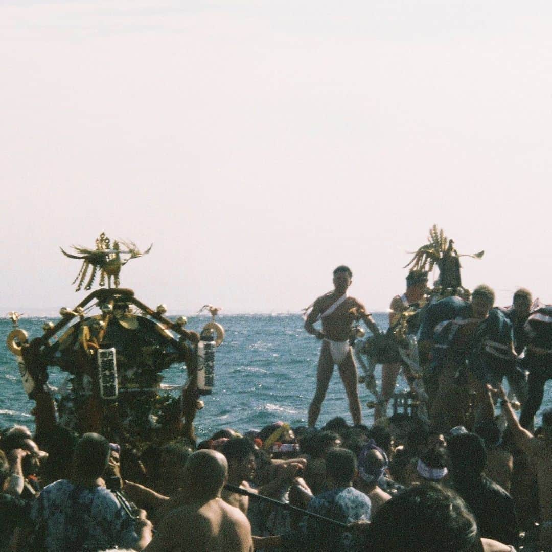 東京DANDYのインスタグラム：「Portable shrines crash into the freezing waves off of kanagawa in celebration of the first full moon of the year. The social kinship of traditional festivals, as well as the income they bring rural areas, are greatly missed during the current pandemic. As situations improve from country to country worldwide, there’s hope for a resurgence of safe domestic travel, adventure and discovery within ones own country.」