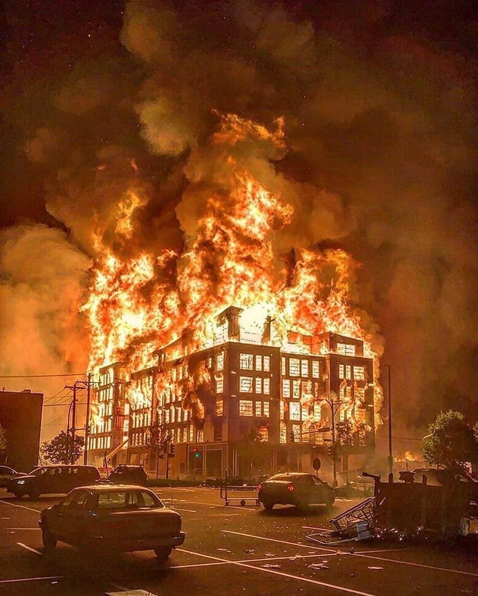 Paul Octaviousのインスタグラム：「Riots are the language of the unheard . “I think America must see that riots do not develop out of thin air. Certain conditions continue to exist in our society which must be condemned as vigorously as we condemn riots. But in the final analysis, a riot is the language of the unheard. And what is it that America has failed to hear? It has failed to hear that the plight of the Negro poor has worsened over the last few years. It has failed to hear that the promises of freedom and justice have not been met. And it has failed to hear that large segments of white society are more concerned about tranquility and the status quo than about justice, equality, and humanity. And so in a real sense our nation’s summers of riots are caused by our nation’s winters of delay. And as long as America postpones justice, we stand in the position of having these recurrences of violence and riots over and over again. Social justice and progress are the absolute guarantors of riot prevention.” April 14, 1967 Martin Luther King at Stanford University.  Photo Taken May 27, 2020 taken last night in Minneapolis / 📸 photo by @slate_mk.2  #justiceforgeorgefloyd #justiceforahmaud  #blacklivesmatter」