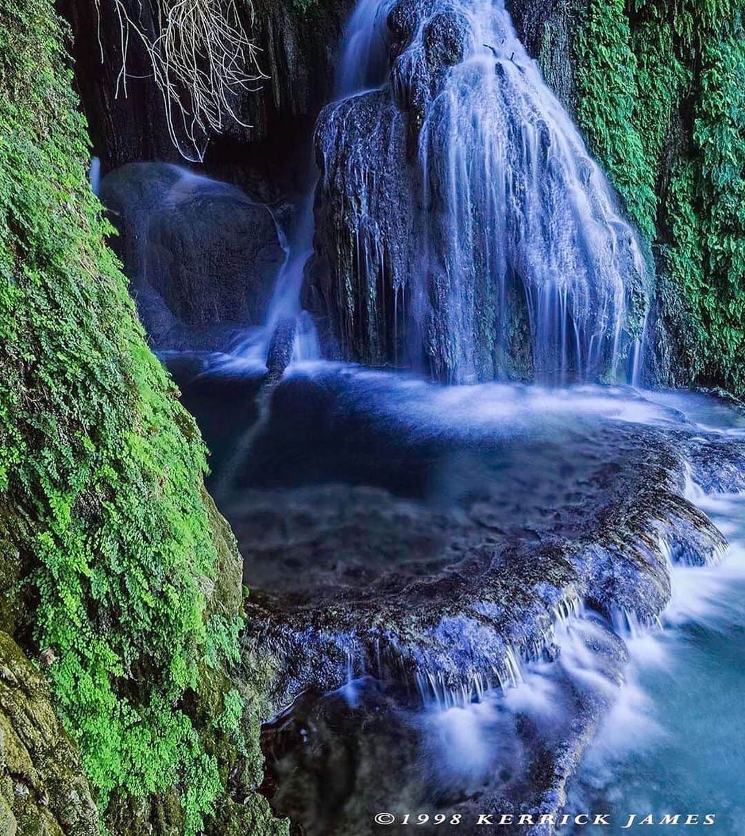 Ricoh Imagingのインスタグラム：「Posted @withregram • @kerrickjames5 Lost beauty...the Grotto of old Navajo Falls, before the 2008 flood. This was a place of power and magic to me, and I rue its loss.. Shot with Pentax 67II and 45mm Takumar lens on Fuji Velvia film. #ricohusa #ricohimagingusa #pentaxians #teampentax #ricohimaging」
