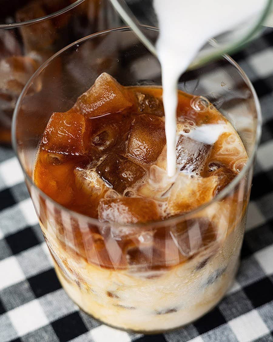 MUJI USAさんのインスタグラム写真 - (MUJI USAInstagram)「Warmer temperatures call for cool, sweet refreshments. Make an Iced Coffee Cube Latte with just a few ingredients.  Iced Coffee Cube Latte (4 servings)  40g Ground Coffee 600mL Hot Water Preferred amount of milk  1. Prepare your coffee by placing it into a dripper and pouring the hot water slowly over. For a more detailed tutorial, check out our DIY highlights! 2. Allow the coffee to completely cool. and pour into an ice cube tray. Freeze for 2-3 hours until set. 3. Add your Iced Coffee Cubes into a glass, and pour your desired amount of milk over and serve. Stir to mix the cubes and milk to create a rich iced latte drink.  Sweet tooth? Add a scoop of vanilla ice cream to turn this into a treat. #muji #mujiusa #mujirecipe #coffee」5月30日 7時01分 - mujiusa