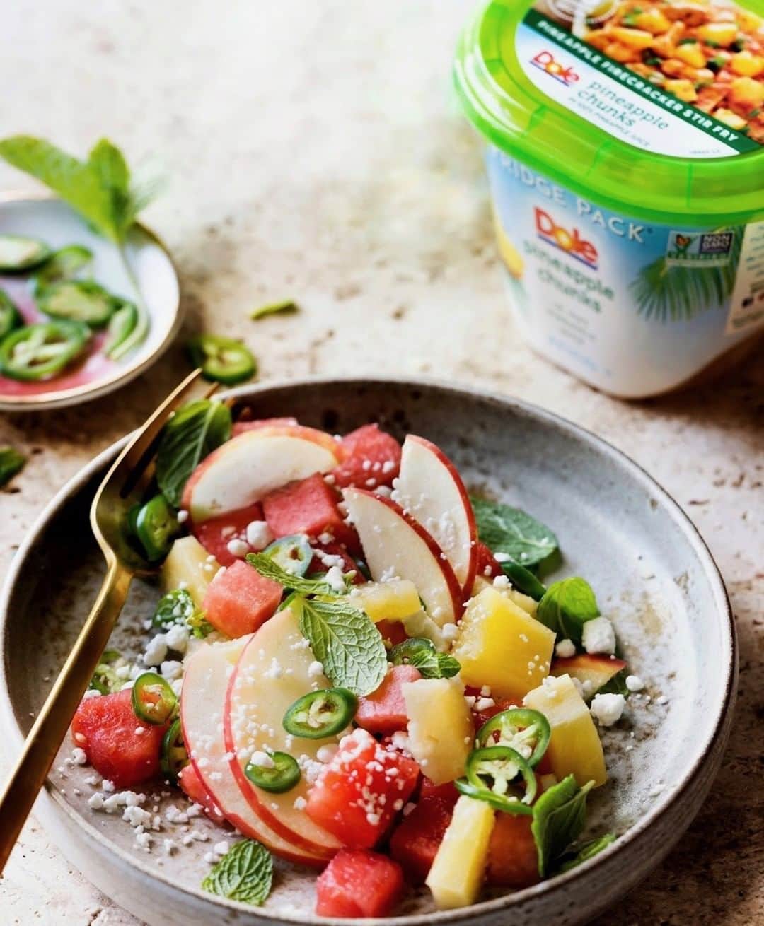Dole Packaged Foods（ドール）のインスタグラム：「Spicy, sweet and everything neat– @bakersroyale_naomi hits all our favorite flavor profiles with her Spicy Tropical Salad by adding our DOLE® Fridge Pack Pineapple Chunks.」