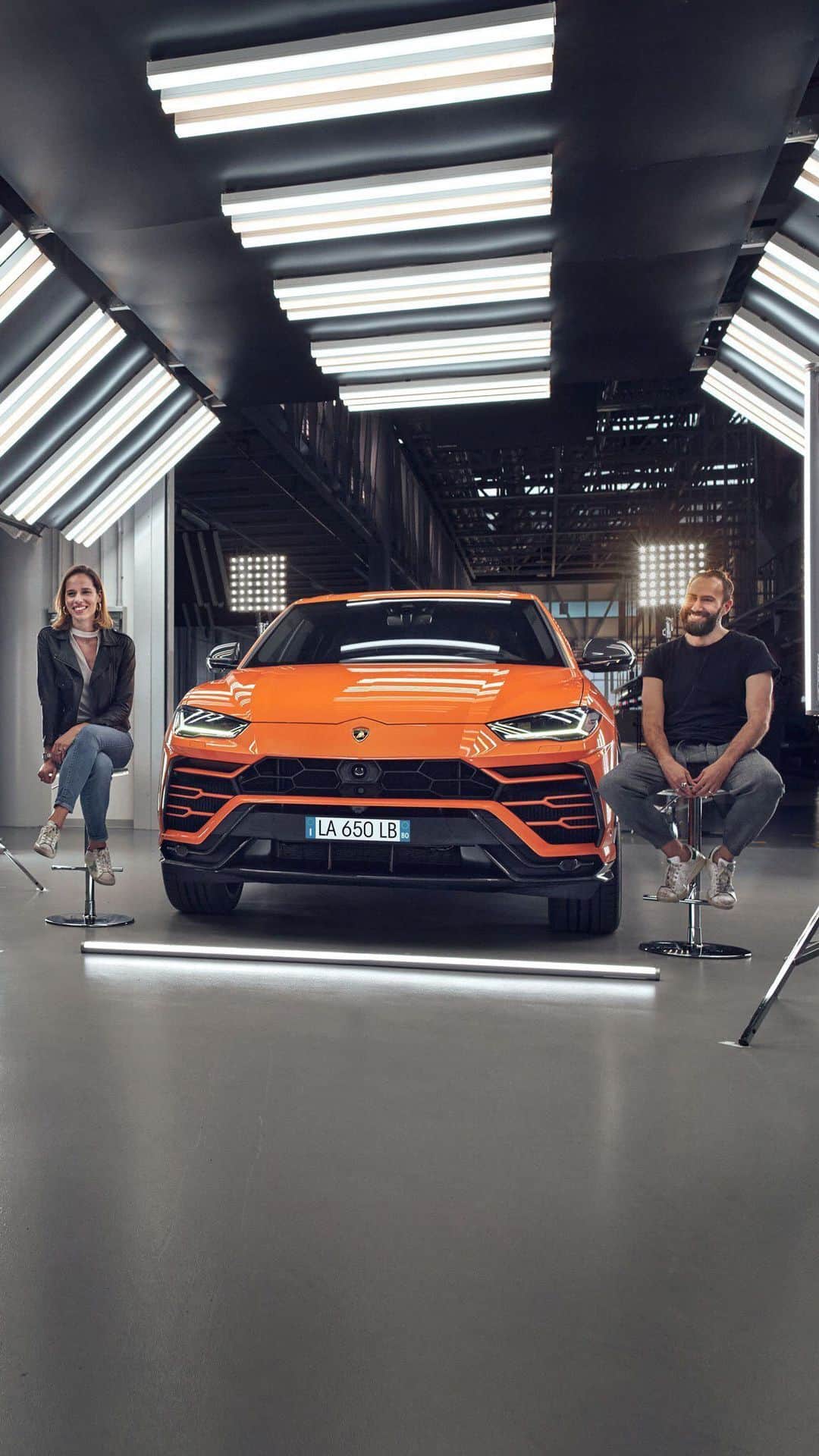 ランボルギーニのインスタグラム：「Emiliano and Caterina are two Lamborghini Lovers. To figure out their personality, we asked them to answer some questions about themselves and then make a choice.  Watch the interview and find out who of them chose Urus Arancio Borealis.  #Urus #Lamborghini #UnlockAnyRoad」