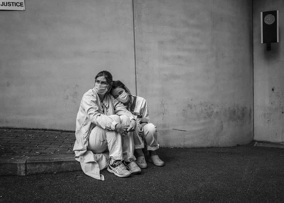 National Geographic Creativeさんのインスタグラム写真 - (National Geographic CreativeInstagram)「Photo by @cedricgerbehaye | A moment of salutary break after two months of intense work for Caroline and Yasmina. Both nurses came as reinforcement to the COVID intensive care unit at Ambroise Paré hospital in Mons in Belgium. For a few weeks the COVID-19 death rate in the country was the highest in the world due to the counting system which included unconfirmed cases in nursing homes for elderly people where tests were impossible or done only late. Featured work created with the National Geographic Society COVID-19 Emergency Fund. To see more of my work follow @cedricgerbehaye」6月26日 0時12分 - natgeointhefield