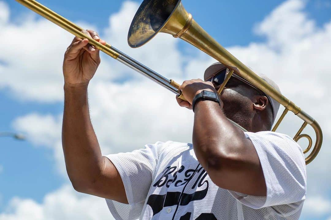 National Geographic Creativeさんのインスタグラム写真 - (National Geographic CreativeInstagram)「Photo by L. Kasimu Harris @visionsandverbs | “Big Sam” Williams of Big Sam’s Funky Nation taking a solo during an online performance from the driveway of his New Orleans home, on Memorial Day. Williams, like so many artists who sheltered-in-place, turned to the internet to remain connected to their fans and offered entertainment and a respite from the isolation. The online concerts have also afforded Williams and his band an opportunity recoup some income through cash apps. Live performance venues in New Orleans remain shuttered do to the coronavirus.」6月26日 4時56分 - natgeointhefield