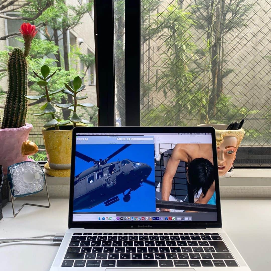 東京DANDYのインスタグラム：「おはよ. Sat at my desk, trying to figure things out. I am easily distracted. I usually work from home, so living in quarantine hasn't been so much of a challenge, actually not having outside distractions has been good for me. While at home in 2017, I was disturbed by the constant sound of low flying helicopters. I realized this was part of the convoy waiting to accompany Donald Trump's helicopter to Yokota airbase. The President of American flying over the suburbs of Tokyo was an opportunity not to be missed, so I headed to the roof of my building to get a shot. From the vantage point, I could see there were at least three convoys of four American military helicopters circling Tokyo. After a while, I was distracted by movement below. A guy wrapped in bedsheets was doing his washing on the balcony. This scene of simple domesticity playing out as America's machines of war roared overhead said so much to me about Japan's relationship with America. I am looking at the images I took on that morning, now reflecting on how I could use them together to tell the story and convey what I felt in that moment. This is part of a new body of work I am putting together. Trump but not Trump Room.」
