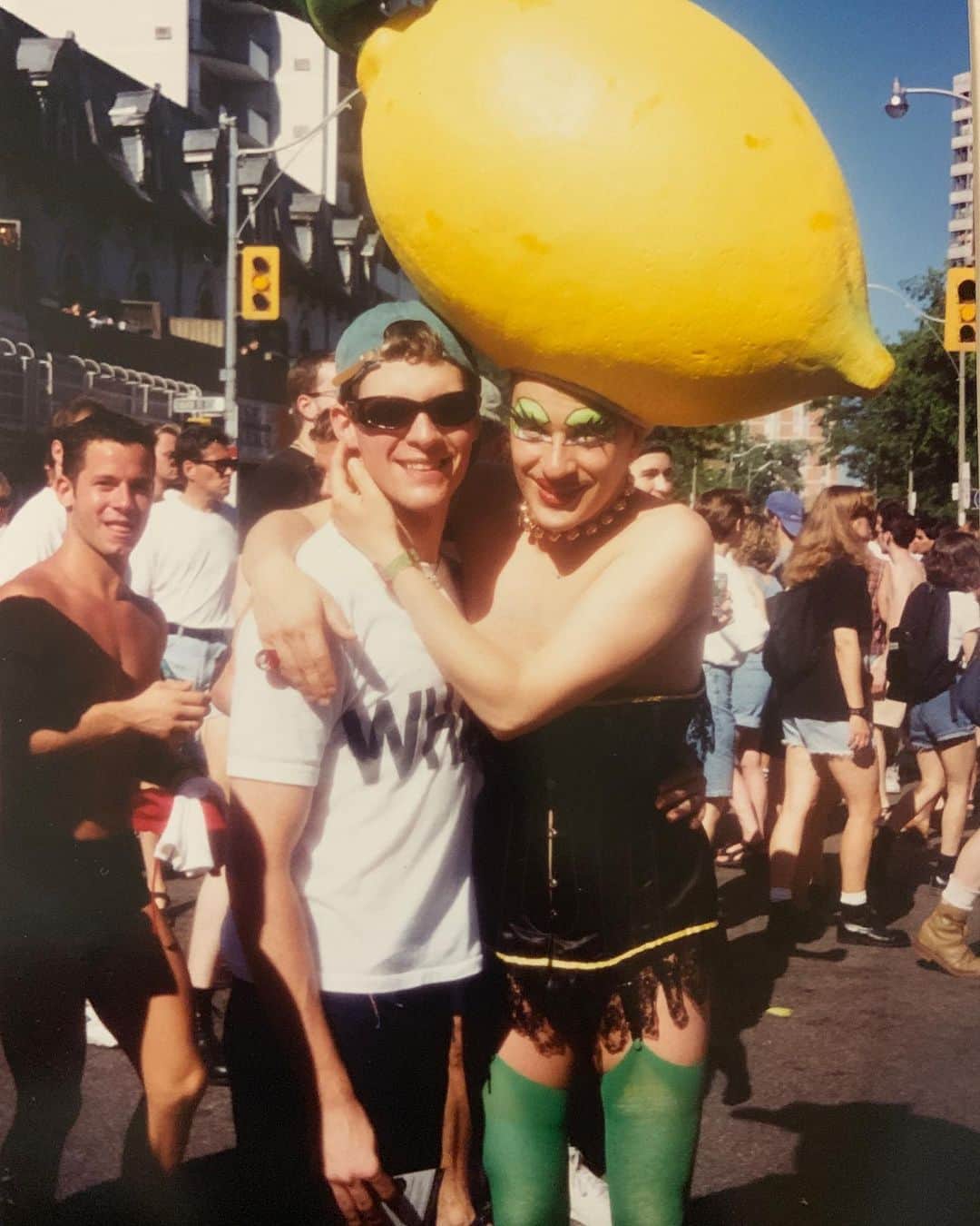 ブラッド・ゴレスキーのインスタグラム：「This is me at my first Pride parade in Toronto in 1996. I wore a baseball hat, sunglasses and a “Wham” T-shirt.  I never wore baseball hats. I still don’t a lot. I think I wore it because I was afraid of someone recognizing me. Still hiding. I remember being struck by how many people were there celebrating. I was immediately obsessed with drag queens. I had felt so alone and afraid for a long time that it was one of the first moments I realized that I would be ok.  When I went back home I was so excited to tell my mom about what I had experienced.  I told her that I somehow got “mixed up” in the parade and how cool it was. Not long after that I came out. Happy Pride 🏳️‍🌈 #tbt」