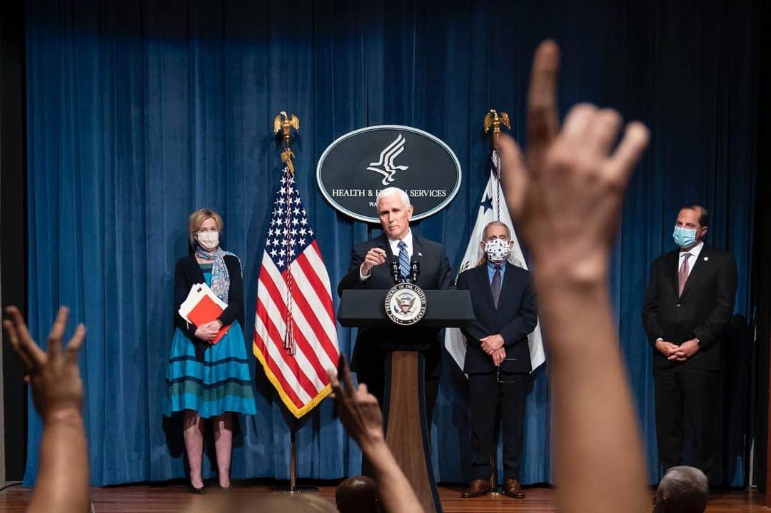 TIME Magazineさんのインスタグラム写真 - (TIME MagazineInstagram)「As the White House Coronavirus Task Force held its first televised press conference in two months on June 26, President Trump was notably absent. The briefing was delivered at the headquarters for Health and Human Services during the worst week on record for COVID-19 cases in the country, with daily cases well surpassing the previous peak in April and erasing all intermittent progress in flattening the curve. Trump’s unwillingness to use his bully pulpit to convince more Americans to help slow the spread of the virus comes at a precarious time for the country, writes Brian Bennett. Health officials are now seeing cases “rise precipitously across the South,” highlighting outbreaks in Texas, Florida, Arizona, California and 12 other states. Epidemiologists caution that as the number of cases goes up, the number of people hospitalized and dying from the disease may also increase two or three weeks later. Asked if he was concerned the death rate may begin to climb, Vice President Mike Pence said, “Our hope and our prayers is that is not the case.” In addition to prayer, according to health officials, Americans can prevent a spike in deaths by staying away from each other and covering their mouths when in public. In these photographs: Pence takes a question, and Dr. Anthony Fauci, the nation’s top infectious disease expert, who recently said he had not spoken to Trump in weeks, listens during the briefing. Read more at the link in bio. Photographs by Joshua Roberts—@gettyimages and @erinscottphoto—Bloomberg/@gettyimages」6月27日 10時13分 - time