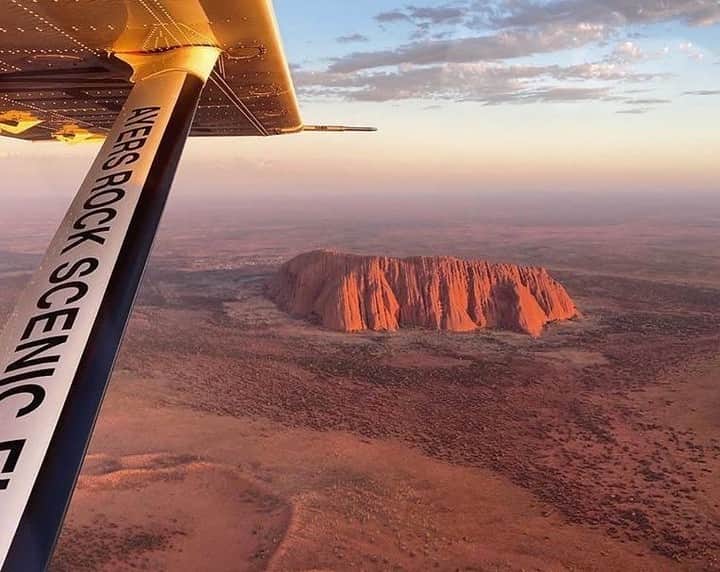 Australiaさんのインスタグラム写真 - (AustraliaInstagram)「With views like these, we’ll be winging our way to @seeuluru first chance we get! @ayersrockscenicflights snapped this staggering shot whilst flying through the @ntaustralia’s Uluru-Kata Tjuta National Park, which recently reopened to visitors. Winter in @visitcentralaus is glorious; we’re talking clear skies and warm days, plus exquisite wildflowers in early spring. Time your trip and stay at @exploreuluru’s #AyersRockResort, which is welcoming visitors from August 2020. #seeaustralia #NTaustralia #redcentreNT #seeuluru #exploreuluru」6月27日 8時00分 - australia