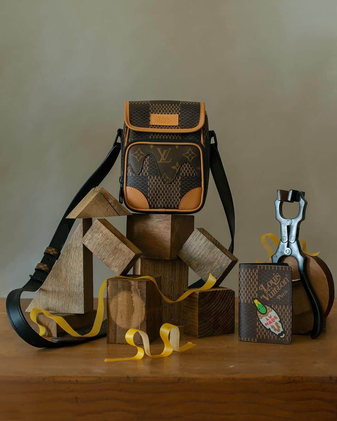 のインスタグラム：「Mixing and maximizing. #LouisVuitton’s Damier canvas takes on a new scale in @NIGO and #VirgilAbloh’s LV² Collection. Discover the entire range of #LVxNIGO leather goods, accessories, and more via link in bio.」