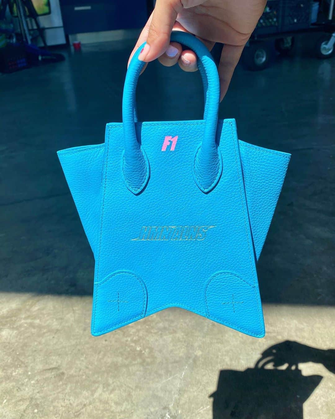 ミシェル・ファンのインスタグラム：「New drop from @hmnalns  Mini Origami bag. This brand embodies my personal aesthetic = anime + future + edgy  Phil you’re a genius.  Support black owned businesses ✊🏿 #hmnalns」