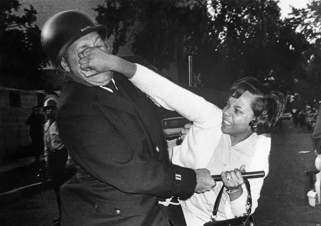 トームさんのインスタグラム写真 - (トームInstagram)「Image : A woman struggles with police on the second night of unrest in Milwaukee, Wisconsin, in the summer of 1967. (Bettmann Archive/Getty Images)  White Milwaukee lied to itself for decades, and in 1967 the truth came out. When the Long Hot Summer came to Wisconsin, the reality of race relations was impossible to ignore  By syreeta mcfadden 2017 @medium  Milwaukee has a peculiar relationship with its black population. The city imagined itself exceptional to the kind of deep racial tensions that gripped most of the North. But still the atmosphere was heavy with suspicion and contempt, mystery and fear. The climate is familiar to southern folk: Severe cold at times, extreme humid thick heat at others, frightful storms and twisters that level whole communities in a matter of minutes. The North Side harbored African Americans, and the South Side was home to generations of white ethnics of German and Polish descent. The topography of Milwaukee’s communities was a microcosm of the racialized lines of the United States. .  It wasn’t a particularly balmy summer night Sunday, July 30, 1967, when all hell broke loose. Midsummer Milwaukee temperatures peaked around a comfortable 70 degrees, and probably drew dewy, yet cool breezes from Lake Michigan, east of the inner core, the 5.5-square-mile community that was home to the city’s 80,000 African Americans. No one was certain about what started the whole thing. The night before, 350 onlookers watched two women duke it out just outside a nightclub on Third Street. Police tried to disperse the crowd but met bitter resistance. The damage was mild. A few smashed windows, rocks, bottles, and trash, cuts and bruises. But the following night would be an entirely different story. Late Sunday into early Monday, a 30-block area of the inner core became embroiled in an uprising that left four dead, 1,740 arrested, and $500,000 in property damage.」6月28日 9時11分 - tomenyc