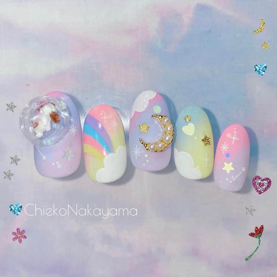 なかやまちえこのインスタグラム：「#星空グラデーション ⠀ きまぐれキャット ピグメント ハイリッチ.ぽんぽんブラシ⠀ マットコート.PREXYグリッター.きまぐれステッカー.寝そべり垂れ耳犬モールド ⠀ #nail #nails #nailart #ネイル #美甲 #ネイルアート  #japanesenailart #manucure #japanesenails #manicurist #gelnails #أظافر #네일아트 #미용 #เพ้นท์เล็บ #искусствоногтя #artedeuñas #เพ้นท์เล็บเจล #ジェルネイルデザイン #ネイルデザイン #senikuku #nagelkunst #寝そべりネイル #星空ネイル #ファンシーネイル #fancynails #skynails #お空ネイル @prexyofficial @bettygel_official @kimagure_cat_whim @pregelofficial」