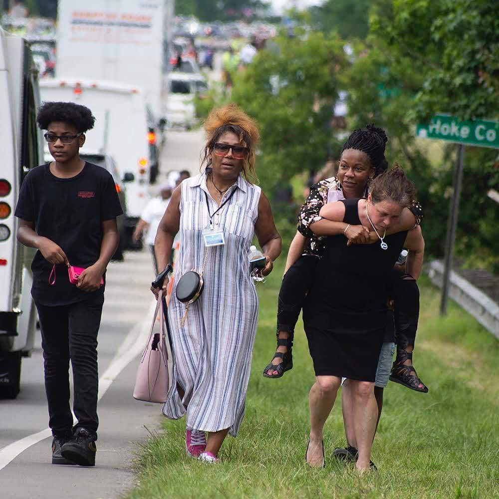 thephotosocietyさんのインスタグラム写真 - (thephotosocietyInstagram)「Photos by @susiepostrust // At the memorial service for George Floyd in Raeford, North Carolina, people walked miles to show their respects. Many found support from each other. Alexia Gyrody (right) wrapped her arms around her friend Amber Mitchell. They had come from Charlotte, NC. Through her tears, Amber said, "I never thought I would be in this. I have an eleven-year-old daughter, and I would hate for this to ever be her reality. “  In a different scenario, Tiawn Lewis walked a mile and a half from her home to the memorial. Because of her MS, she couldn't get back home on her own. Strangers walking past her took turns giving her piggyback rides until they could get her to EMS who gave her a ride home.  Follow me @SusiePostRust for more images of the Change We Want in North Carolina.  @thephotosociety #georgefloydmemorial #georgefloyd  #friendship  #ShowUp #MainStreetNC #raefordnc #TimeToShowUp」6月7日 11時24分 - thephotosociety