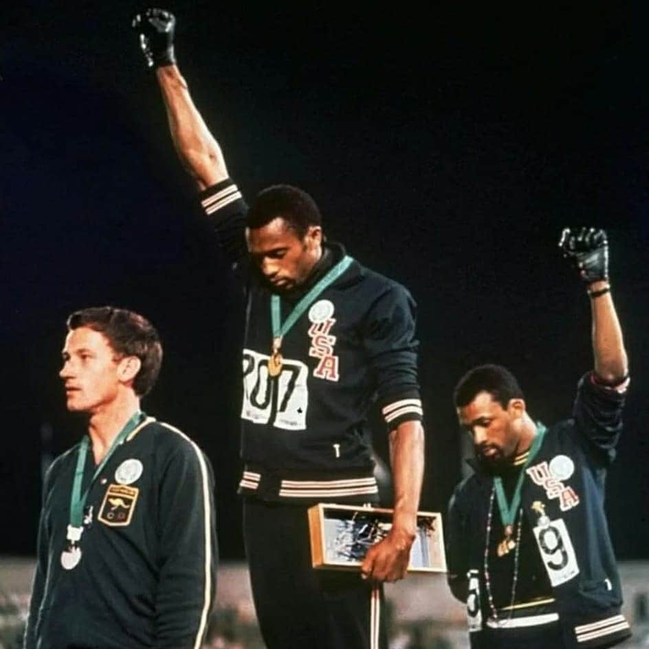 ガス・ケンワージーさんのインスタグラム写真 - (ガス・ケンワージーInstagram)「I think this is one of the most powerful images in the history of sport. US Olympians Tommie Smith (Gold) and John Carlos (Bronze) raise gloved fists on the podium at the '68 Games to stand up to the racial injustice that Black people were (and still are) facing in the US and around the world. They took off their shoes and stood in socks to bring attention to the plight of Black poverty back home, wore beads around their neck to protest lynchings and, along with Peter Norman the Australian who won silver, wore patches of the Olympic Project for Human Rights - a group that Smith and Carlos helped organize as a way to reflect their Black pride and social conciousness. Norman was essentially cancelled by the Australian Olympic Committee for standing in solidarity with Smith and Carlos. Despite qualifying for multiple subsequent Olympic Games as the #1 Australian in the world the country instead chose not to send a sprinter at all and refused to recognize his accomplishments until 2012, six years after his death. Smith and Carlos were booed off the podium, kicked out of the Games, suspended from Team USA and went home to death threats. 48 years later when Colin Kaepernick peacefully knelt to protest racial injustice and police brutality in the US he was blackballed from the NFL. White people, now it is all of our chance to be a Norman and to stand in solidarity with Smith, Carlos, Kaepernick and the entire disenfranchised Black community. If you can march, march! (If you're in LA join me on Sunday - see slide 3). If you can donate, donate! (See slides 4 & 5 for good suggestions on where to give your money - thanks @stephseemsok for the list). If you can't do either of those things then educate yourself! I suggest starting by watching the Racial Wealth Gap episode of "Explained" on @Netflix, it takes 15 minutes and it's incredibly eye-opening. Have difficult discussions with family members who may not understand the Black Lives Matter movement. Sign petitions, make calls and write e-mails to demand justice and help create change! Do anything but don't do nothing. All lives will matter when Black lives matter. ✊🏻✊🏼✊🏽✊🏾✊🏿」6月12日 6時30分 - guskenworthy