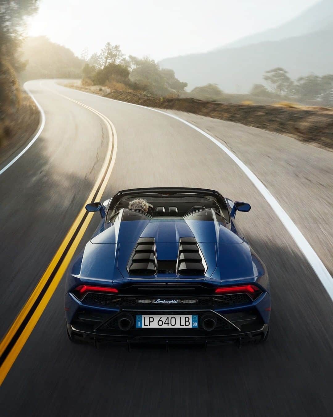 ランボルギーニのインスタグラム：「True perfection leaves a mark everywhere it goes.  Cutting edge technology and incredible aesthetics - these are only a few qualities that describe the exceptional Huracán EVO Spyder. With its authentic Italian design and refined aerodynamic solutions, it's perfection personified.  Photo by @oskarbakke  #Lamborghini #HuracanEVOSpyder #EveryDayAmplified」