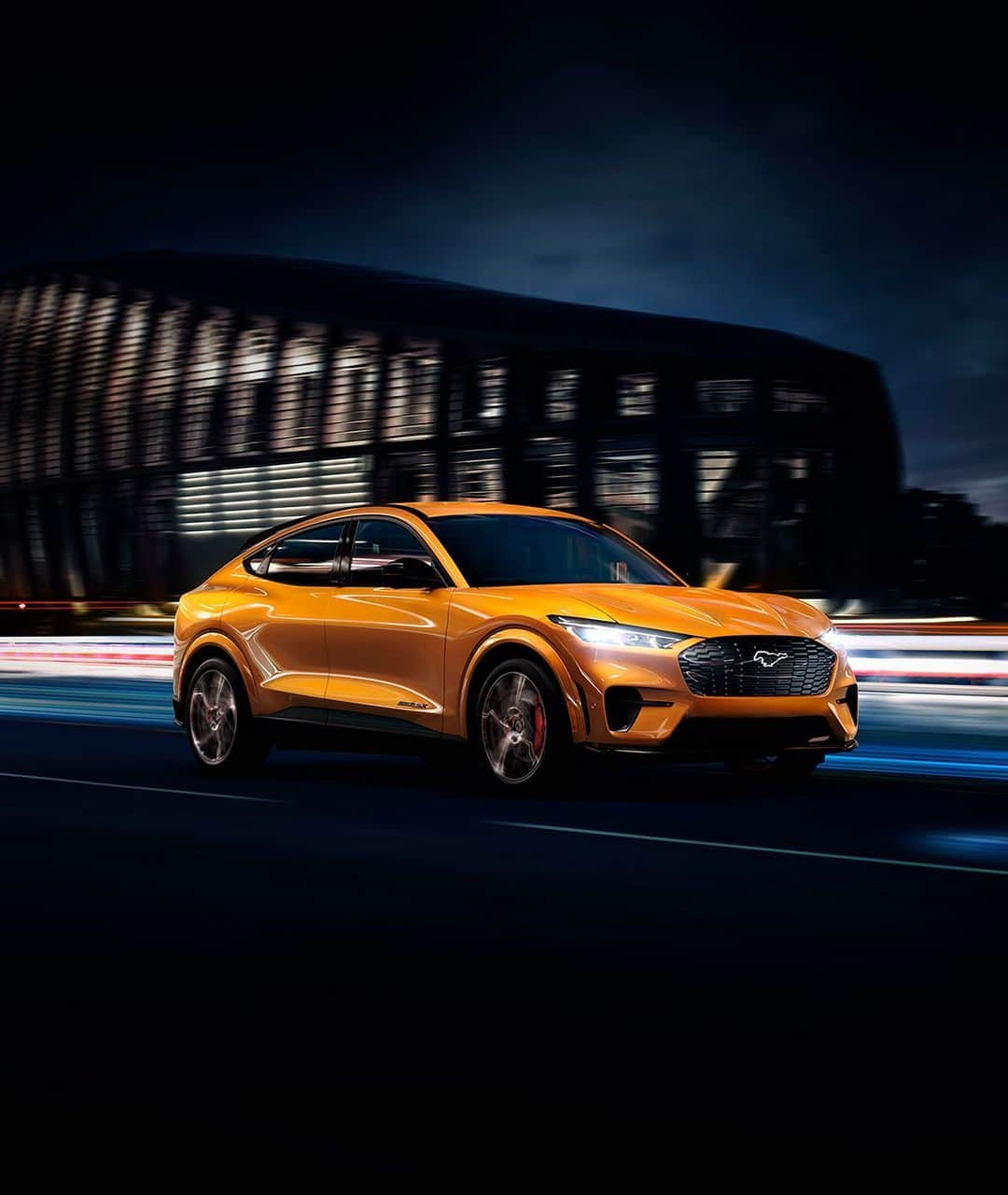 Fordさんのインスタグラム写真 - (FordInstagram)「Stand out. The 2021 #MustangMachE GT in Cyber Orange. . #Ford #FordMustang #EV . Preproduction model shown. Cyber Orange available on 2021 Mustang Mach-E GT only. Available late Summer 2021.」6月13日 4時41分 - ford