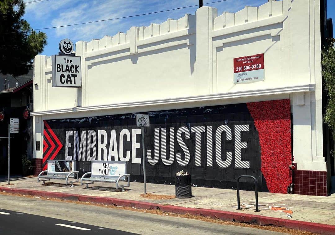 Shepard Faireyさんのインスタグラム写真 - (Shepard FaireyInstagram)「Embrace Justice. A simple message for a complex problem. Thanks to one of my favorite restaurants in Silver Lake, @theblackcatla, for the wall space and shared philosophy. The Black Cat is a historic LGBTQ+ bar in Los Angeles, where it was the site of one of the first demonstrations in the U.S. protesting police harassment within the LGBTQ+ community. I’m proud to get my art up on their wall, especially during #PrideMonth. Thanks to Rob Zagula, Luka Densmore, and Jason Filipow for the help with facilitation and installation! -Shepard」6月13日 7時38分 - obeygiant