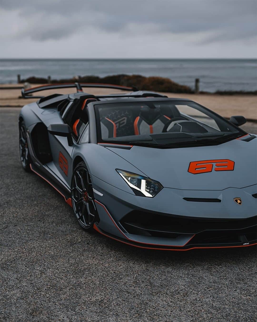 ランボルギーニのインスタグラム：「Dynamism and exclusivity achieved through a blend of perfection and innovation.  Aventador SVJ 63 Roadster is the V12-engined Super Sports Car whose lines, with the roof on or off, clearly identify its aerodynamic design and superiority, thanks to Lamborghini’s ALA 2.0 system.  #Lamborghini #AventadorSVJ63Roadster」