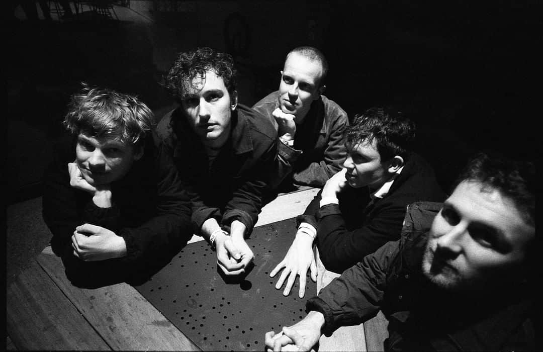 アンダーグラウンドのインスタグラム：「The British post-punk scene has come a long way since their establishment in the 1970’s with often minimalist and sometimes avant-garde experimentation with classic rock and punk. Formed in Brighton, modern post punks Squid played their first gig after replying to an advert for ‘young person’s jazz night’. Rapidly compiling a set with jolty, angular guitars, pronounced basslines and yelping vocals, they perked up the ears of Speedy Wunderground. ⁠ ⁠ We have scouted out eight ferocious British post-punk bands for your essential listening. Read full article on our blog, link in bio.⁠ ⁠ #squid #postpunk #britishmusic #undergroundengland」