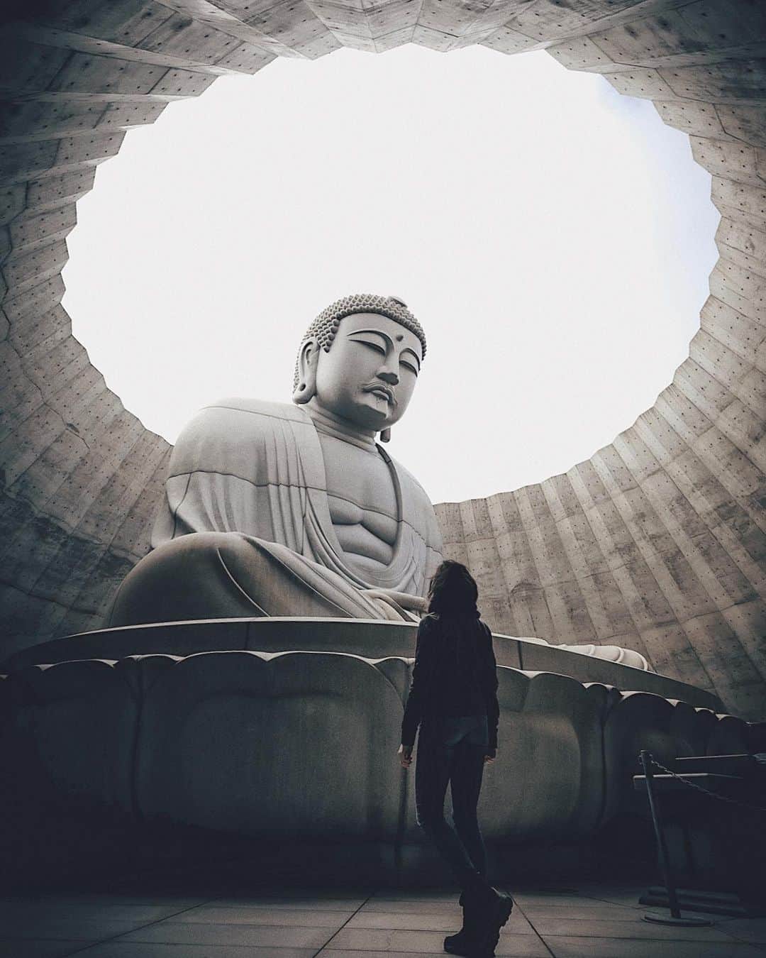 Berlin Tokyoのインスタグラム：「Below the head hidden from view, a Buddha statue lies in the concrete rotunda embodying tranquility and blissfulness. . . . #hellofrom Hokkaido, #japan」