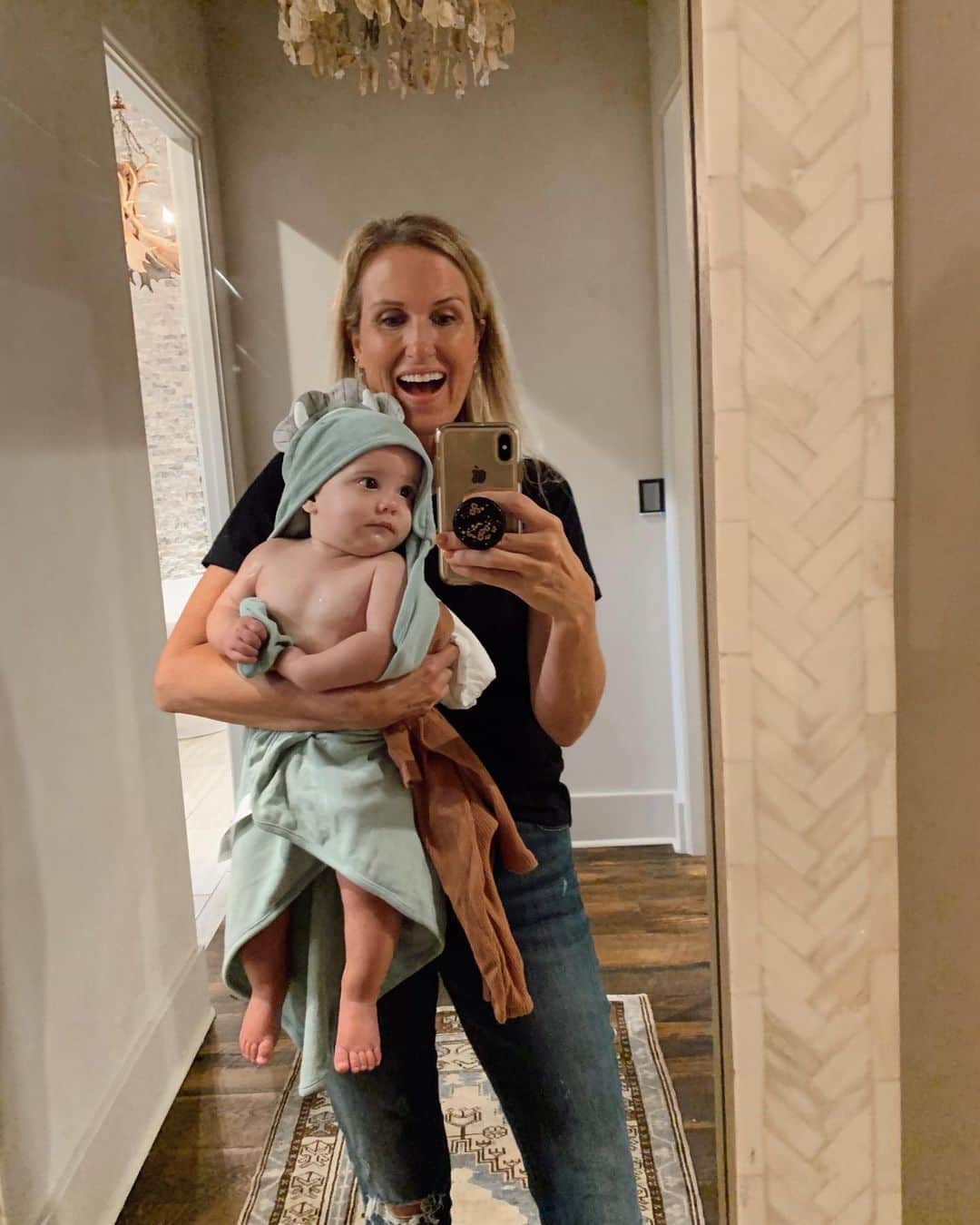 コリー・ロバートソンさんのインスタグラム写真 - (コリー・ロバートソンInstagram)「I love to come around the corner of my bathroom and see my grand babies faces in this mirror.  They get excited every time they see themselves and it makes me happy every time I see them in my arms.  They are getting old enough now that they remember this mirror is here and start kicking their legs even before we round the corner. ⠀ ⠀ I’ve been reading James over and over again throughout all of the hard things that 2020 has brought. There is so much there that speaks to what we are going through right now. I have also been listening and reading a lot to things online and in the news and honestly sometimes I feel like I don’t know what’s up or down, right or wrong, truth or lies. ⠀⠀ ⠀⠀ BUT thankfully God’s word has proven itself once again to be always good and true. In His word I find truth and peace, strength and confidence, forgiveness and compassion, challenge and grace, freedom and love. Here’s an exert from James to soak on: ⠀⠀ “My dear brothers and sisters, take note of this: Everyone should be quick to listen, slow to speak and slow to become angry, because human anger does not produce the righteousness that God desires. Therefore, get rid of all moral filth and the evil that is so prevalent and humbly accept the word planted in you, which can save you. Do not merely listen to the word, and so deceive yourselves. Do what it says. Anyone who listens to the word but does not do what it says is like someone who looks at his face in a mirror and, after looking at himself, goes away and immediately forgets what he looks like. But whoever looks intently into the perfect law that gives freedom, and continues in it—not forgetting what they have heard, but doing it—they will be blessed in what they do. Those who consider themselves religious and yet do not keep a tight rein on their tongues deceive themselves, and their religion is worthless. Religion that God our Father accepts as pure and faultless is this: to look after orphans and widows in their distress and to keep oneself from being polluted by the world.”⠀⠀ ‭‭James‬ ‭1:19-27‬ ‭NIV‬‬」6月15日 6時32分 - bosshogswife