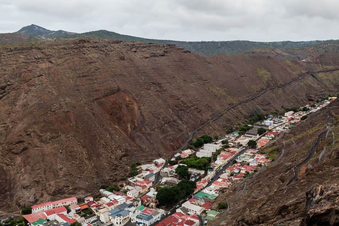 National Geographic Travelさんのインスタグラム写真 - (National Geographic TravelInstagram)「Photo by @robert_ormerod | Sandwiched between rocky hilltops lies Jamestown, the capital of Saint Helena, an isolated island in the South Atlantic Ocean. The town was founded in 1659 by colonists from the East India Company and was a vital stopping point for shipping until the 1870s. After his defeat in 1815 at the Battle of Waterloo, Napoleon Bonaparte was exiled to Saint Helena until he died in 1821. Saint Helena is part of a British Overseas Territory alongside Ascension and Tristan da Cunha.」6月15日 21時08分 - natgeotravel