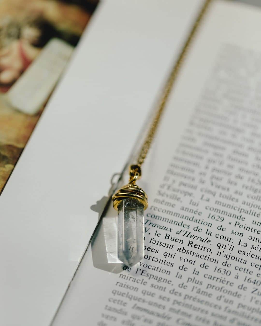 グーセンス パリのインスタグラム：「TALISMAN rock crystal pendant in brass soaked in a 24-carat gold bath, yellow gold color.」