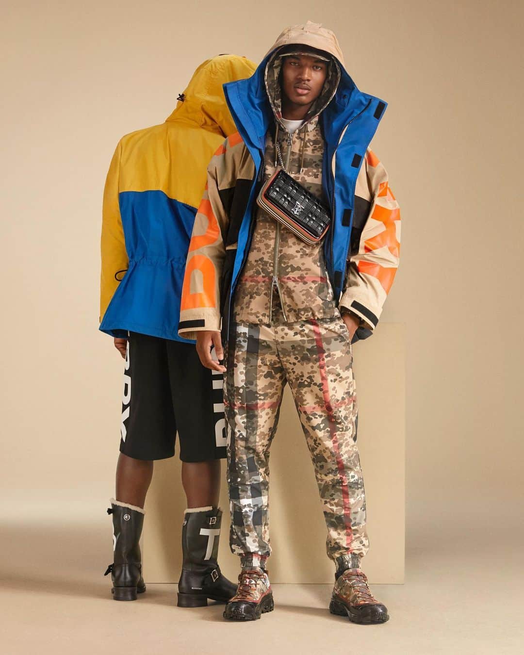 のインスタグラム：「#DankoSteiner photographs #ReeceNelson for the new #BurberryPreAW20 campaign . A contemporary revival of archive pieces, created with a sense of vibrancy. Framed with our logo print, the colour-block jacket in technical twill is contrasted with our camouflage check hooded jacket and track pants . #Burberry.」
