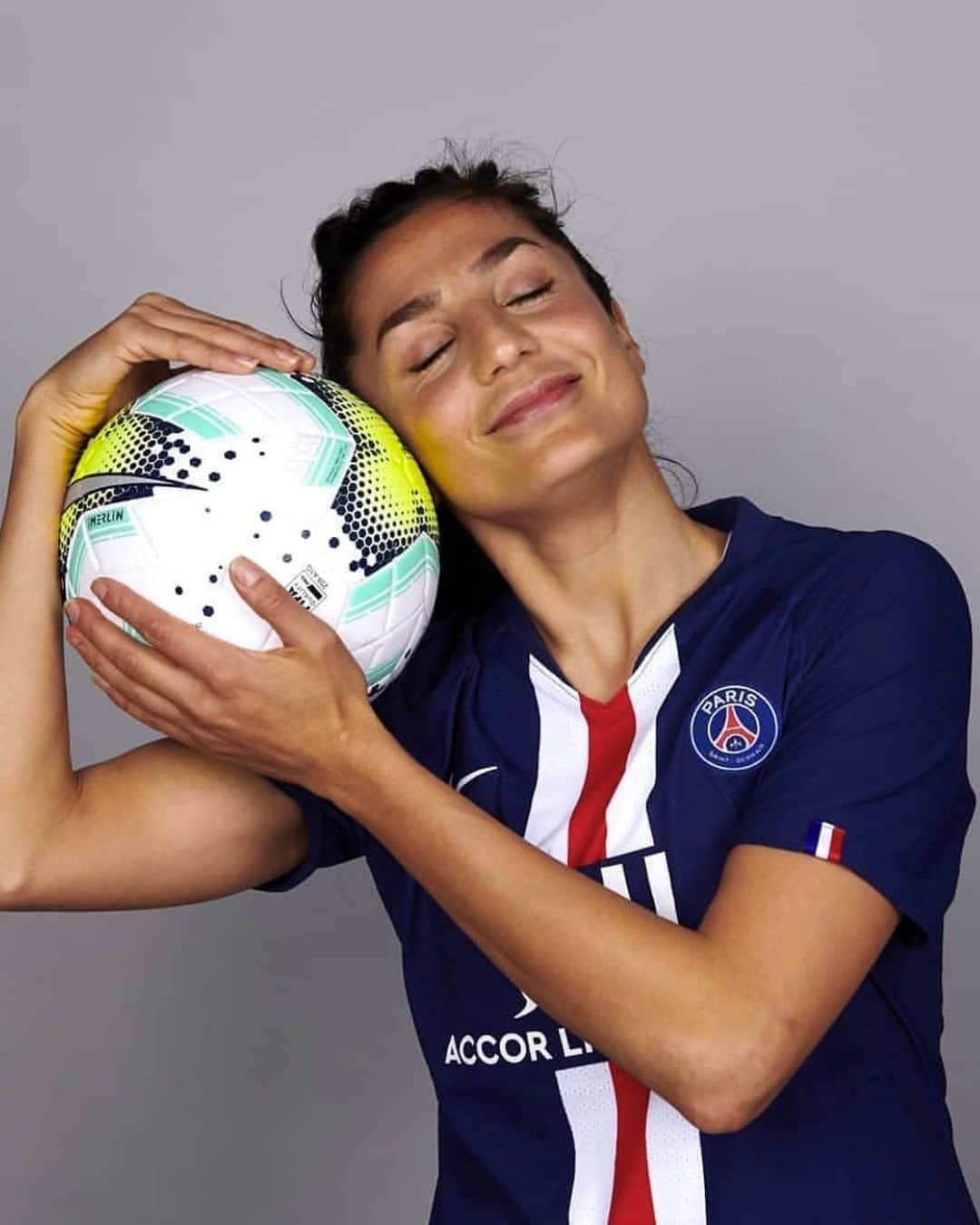 British Vogueさんのインスタグラム写真 - (British VogueInstagram)「“If you give refugees a chance, they can make society better.” @Nadi9Nadim, refugee, pro footballer and surgeon, fled Afghanistan with her mother and four sisters aged 10. “We had to leave because of the war. My dad was killed by the Taliban. We were smuggled to Pakistan, then travelled to Italy with fake passports and from there, smuggled into Denmark behind trucks.” On #WorldRefugeeDay, the prolific Afghan-Danish footballer discusses her journey with #BritishVogue; from fulfilling her dream of becoming a reconstructive surgeon to her plan to “change the people around me everywhere I go”. Read the full interview now at the link in bio.  Photograph courtesy of @PSG.」6月20日 18時15分 - britishvogue
