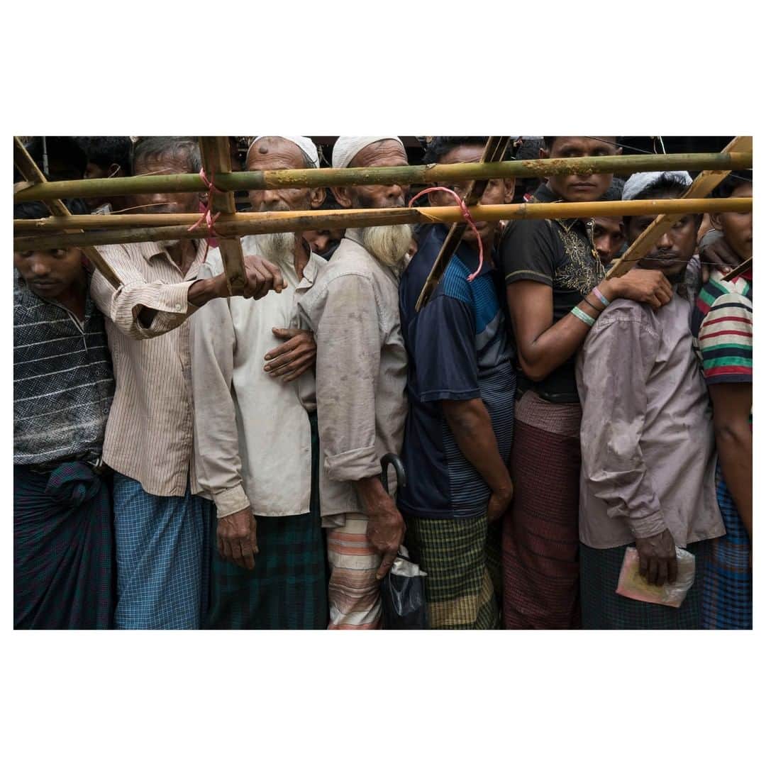 Magnum Photosさんのインスタグラム写真 - (Magnum PhotosInstagram)「At the Hakimpara refugee camps, Rohingya wait in line to receive their family meal and cooking ration coupons. Cox's Bazar. Bangladesh. October, 2017. ⁠ .⁠ Today, June 20 is World Refugee Day. ⁠ .⁠ @chien_chi_chang's images from his visit to Cox’s Bazar in 2017 depicted life in the Rohingya refugee camps in Bangladesh.⁠ .⁠ From August to December 2017, 600,000 Rohingya had fled across the border of Myanmar to Bangladesh following a violent confrontation in Rakhine state that quickly escalated into what the United Nations has called a “textbook example of ethnic cleansing.” ⁠ .⁠ © @chien_chi_chang/#MagnumPhotos⁠ .⁠ #WorldRefugeeDay」6月21日 3時01分 - magnumphotos