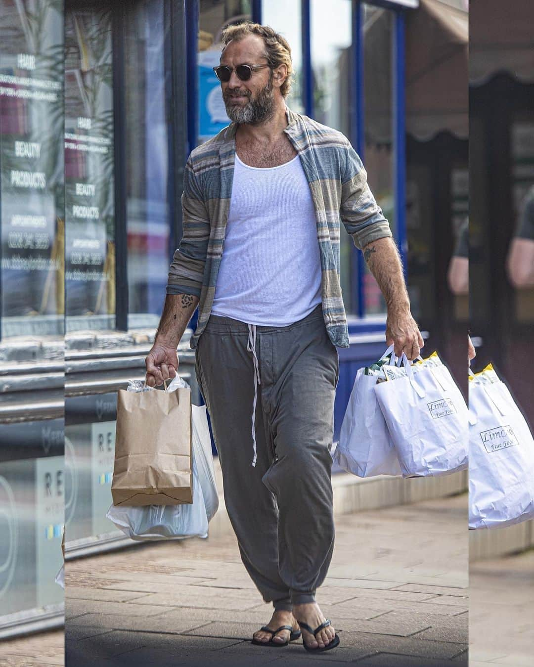 Just Jaredさんのインスタグラム写真 - (Just JaredInstagram)「Jude Law steps out in London to pick up some groceries. His “Sexy Sadie” tattoo for ex-wife Sadie Frost is now covered up with a fish tattoo on his left arm. #JudeLaw Photo: Backgrid」6月21日 3時42分 - justjared