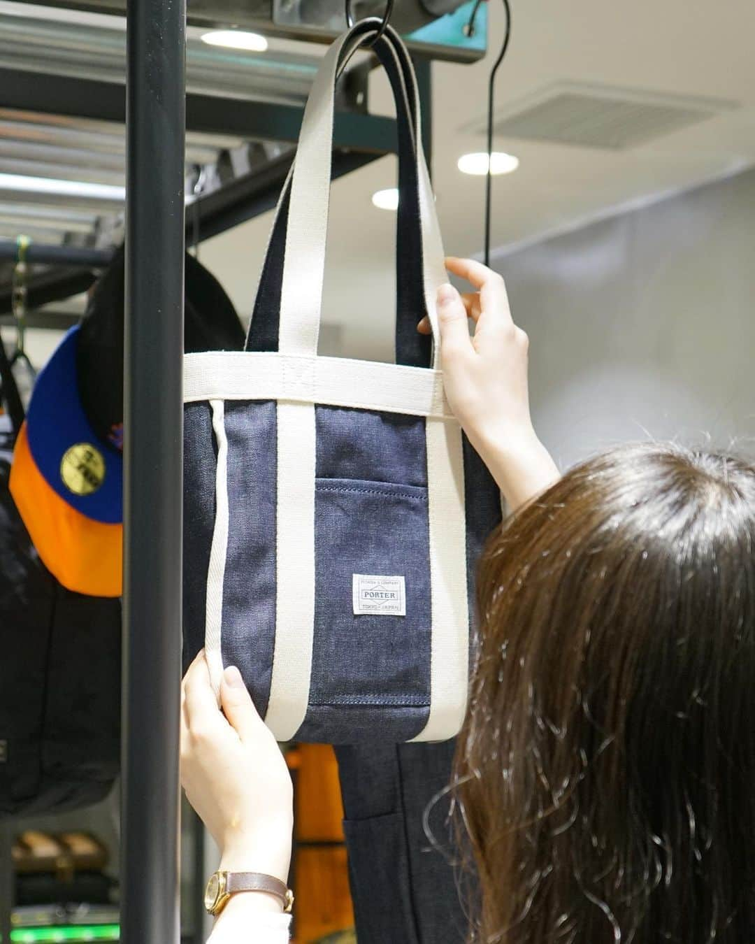 PORTER STANDさんのインスタグラム写真 - (PORTER STANDInstagram)「.﻿ ﻿ SHOP ORIGINAL﻿ STAND TOTE DENIM﻿ ﻿ 吉田カバンの編集によるコンセプトショップ「PORTER ﻿ STAND」で定番のリバーシブルトートバッグをリサイズしたシリーズ。﻿ ﻿ TOTE BAG（S）﻿ No.384-05673﻿ ￥13,000+tax﻿ W340/H360/D125mm﻿ ﻿ #吉田カバン #ポーター #yoshidakaban #porter #luggagelabel ﻿ #porterflagshipstore #madeinjapan #japan #porterstand #shinagawa #tokyo ﻿#kyoto #standtote #totebag #denim #rigid #reversible」6月21日 12時01分 - porter_stand