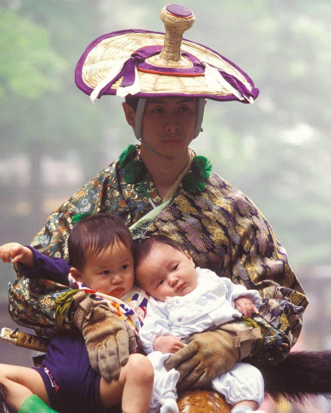 Michael Yamashitaさんのインスタグラム写真 - (Michael YamashitaInstagram)「Samurai Daddy, Nikko, Japan — a horseback archer in traditional hunter attire gives his kids a ride after a horseback archery event (Yabusame) at the annual Nikko Grand Spring festival. Today is Father’s Day in USA in honor of fathers everywhere. Wishing you all a Happy Dad’s Day. #fathersday #samurai #nikko #yabusame #babysitter #babysitting」6月21日 20時23分 - yamashitaphoto