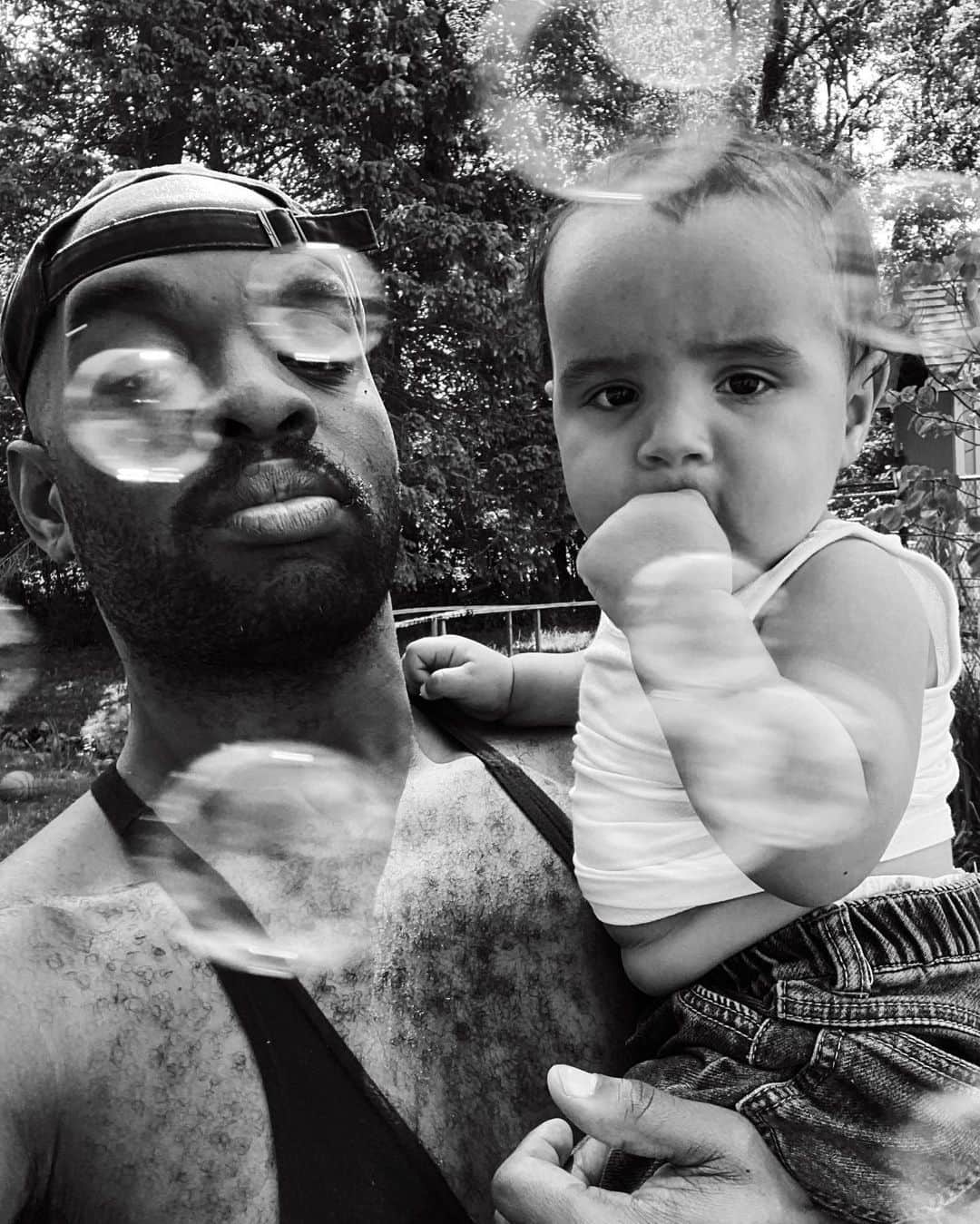 Paul Octaviousのインスタグラム：「I rather we bring the fight of racism,  getting uncomfortable and publicly talking about White supremacy fighting for what is right than making my son do it for his kids.  The photos of memories I’ll get to take and share with this little human for the rest of my life warms my soul.  I would like to thank his moms for letting me share the gift that is him.  Notes for Seb: Seb this is you at 9 months taken a few days ago along the Fox River. The bubbles are being blown Grandma Cookie and you just got out of the pool (which you like you now) . . . #blackfathers #blackfathersmatter #blm #blacklivesmatter #equality #gay #dad #twomomsonedad #queerfamily」