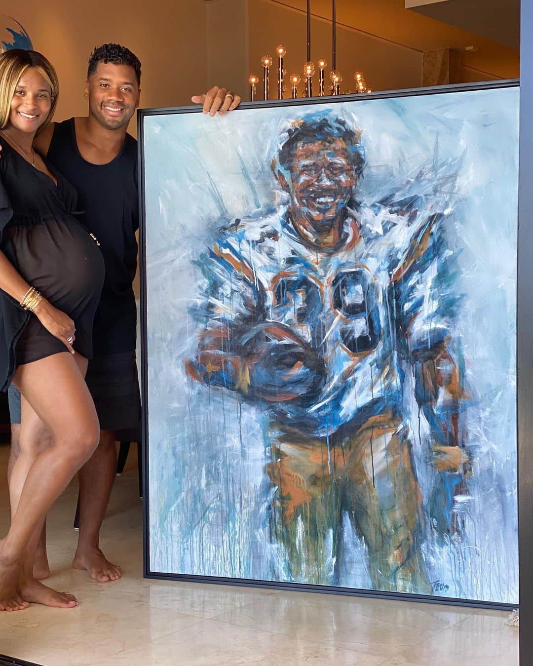 ラッセル・ウィルソンのインスタグラム：「Father like Son! Thanks Baby @Ciara for the dopest painting ever! San Diego #Chargers #HappyFathersDay 🧑🏼‍🎨: @tracy_boyd_art」
