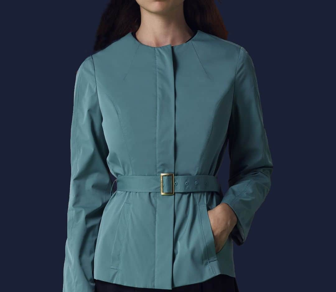 アクアスキュータムのインスタグラム：「The #Aquascutum Cora is effortless elegance. With a fitted silhouette and punchy aquamarine hue, it’s the perfect hard-working staple to add to your wardrobe. Our design team relied on age-old Aquascutum craftsmanship techniques to create this sophisticated collarless blouson.」