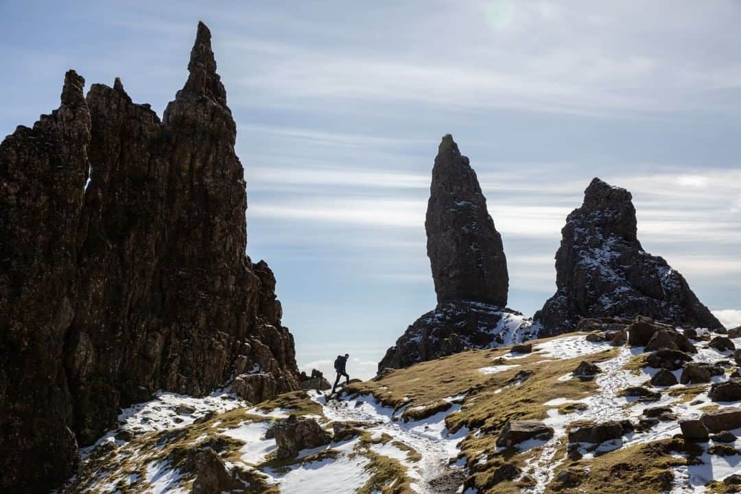 National Geographic Travelさんのインスタグラム写真 - (National Geographic TravelInstagram)「Photo by @MichaelGeorge | As you drive the Isle of Skye in Scotland, you will come across many fantastic features in the landscape. The Storr are a family of intimidating rock formations on the Trotternish peninsula. It only takes about 90 minutes to hike up to these behemoths, but once you’re there, the experience is both awe-inspiring and disconcerting. Though these rocks have been here for a long time, they lean at such an angle that you can’t help but worry about where you’d go if they decide today is the day to fall.  For more photos and writing from my travels, follow along @MichaelGeorge. #isleofskye #scotland #trotternishpeninsula #storr #oldmanofstorr」6月22日 21時07分 - natgeotravel