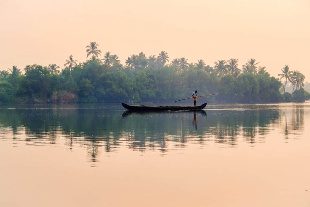 National Geographic Travelさんのインスタグラム写真 - (National Geographic TravelInstagram)「Photo by @francescolastrucci | A man fishes at sunrise in Kerala, India. The traditional rowboat floats in front of the secluded shores of Kakkathuruthu (Island of Crows), a small island on India's largest lagoon, Lake Vembanad. I photographed a series of images of the backwaters immersed in a dreamlike environment: the gradient of the fist daylight, the mirroring waters, and the echoes of the chants coming from the surrounding temples.  Follow me @francescolastrucci for more places, daily life, and stories around the world. #india #kerala #backwaters」6月23日 13時09分 - natgeotravel