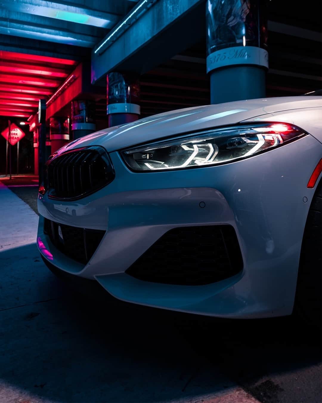 BMWのインスタグラム：「The lights of power. #THE8 #BMW #8Series #BMWrepost @automotive_design @frankypuentes  __ BMW M850i xDrive Coupé: Fuel consumption in l/100 km (combined): 10.0–9.9. CO2 emissions in g/km (combined): 227–224.  Further information: www.bmw.com/disclaimer. Acceleration (0-100 km/h): 3.7 s. Power: 390 kW, 530 hp, 750 Nm. Top speed (limited): 250 km/h.」
