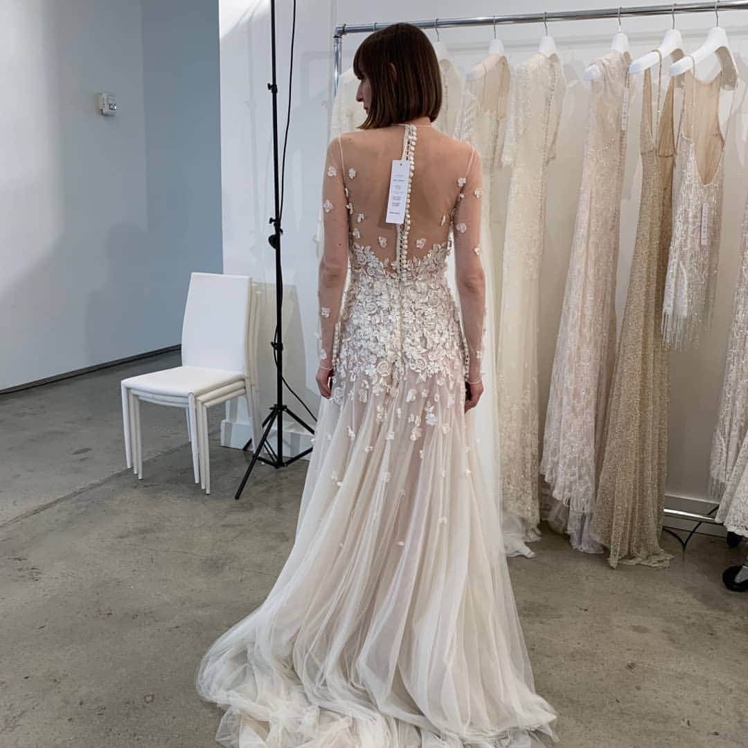 LAVIEEN ROSE Weddingさんのインスタグラム写真 - (LAVIEEN ROSE WeddingInstagram)「Romantic & Mode… 　femininity ﻿﻿♡" ﻿﻿ シアーな素材と大胆なイリュージョンネックライン。 クラシックなAラインのシルエットで、おとぎ話の世界を彷彿とさせるフレンチチュールガウン。 ﻿﻿ ﻿﻿ #costarellos / コスタレロス﻿🌿﻿﻿ ﻿﻿﻿﻿ ﻿ ” Galene ” ﻿﻿﻿﻿﻿ ﻿ ﻿﻿#costarellosDREAMERS ﻿﻿﻿ ﻿﻿ #costarellosbrides ﻿ ﻿﻿ ﻿﻿ Marrying sheer fabric and a daring neckline with a classic A-line silhouette, this ethereal French tulle gown is straight out of a fairytale.  A multitude of intricate floral lace appliqués sculpt the bodice and adorn the sheer sleeves creating a second-skin effect.  Subtle shine glimmers from the bodice’s sequin detail as wispy layers of French tulle float down to a sweeping hem.  The back turns to reveal an array of floating covered buttons slowly vanishing as a myriad of tiny florals dance across the back of the gown. ﻿﻿﻿﻿﻿ ﻿﻿﻿﻿ ﻿﻿﻿#ラビアンローゼ﻿﻿ #インポートドレス #インポートドレスショップ #ウェディングドレスレンタル #ナチュラルウェディング#2020秋婚 #大人花嫁 #全国の花嫁さんと繋がりたい #プレ花嫁さんと繋がりたい#プレ花嫁 #hawaiiwedding #卒花嫁 #結婚式 #結婚準備 #2020夏婚#weddingphotography #ドレス試着 #weddingphoto #ガーデンウェディング #ウエディングドレス #ハワイ #レストランウェディング #2020秋婚 #海外ウェディング #国内パーティー﻿﻿ #ナチュラルウェディングドレス #ナイトウェディング ﻿﻿﻿﻿ ﻿﻿﻿﻿﻿ ﻿﻿﻿ ﻿﻿﻿ ﻿﻿﻿﻿ ﻿ ﻿ ﻿﻿﻿ ﻿ ﻿ ﻿﻿ ﻿ ﻿」6月24日 12時33分 - lavieenrosewedding