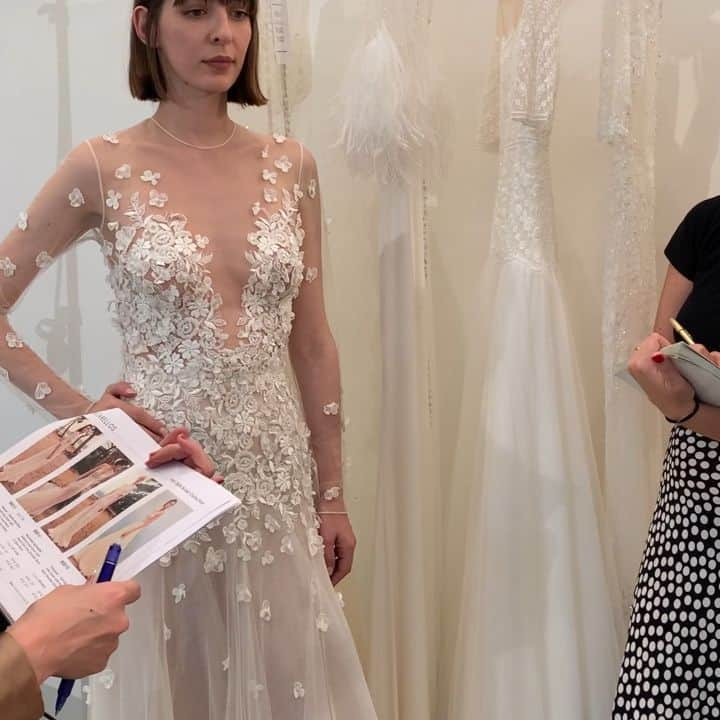 LAVIEEN ROSE Weddingのインスタグラム：「﻿﻿﻿New york🗽　  Bridal fashion week👗 ﻿ ﻿﻿  ﻿﻿ costarellos / コスタレロス﻿﻿ ﻿﻿﻿ ﻿ ” Galene ” ﻿﻿﻿﻿ガラネ ﻿﻿﻿ 散りばめられた立体的なフラワーレースと﻿﻿﻿ ﻿﻿﻿ ﻿落ち着いた色合いのベージュトーンの﻿﻿﻿ ﻿﻿ ライニング。﻿ ﻿﻿﻿ モードな中に﻿柔らかな雰囲気を印象づける﻿﻿﻿﻿ ﻿﻿﻿ #ウェディングドレス﻿﻿﻿﻿ ﻿﻿﻿ ﻿ 柔らかく流れるようなシルエットは﻿﻿ ﻿﻿﻿ 女性らしく上品な雰囲気に﻿😌 ﻿﻿﻿ ﻿﻿﻿ 透け感のあるロングスリーブと﻿﻿﻿ ﻿﻿﻿ 控えめなビーティングで﻿﻿﻿﻿ ﻿﻿﻿ 大人っぽく着こなせます♡﻿ ﻿﻿﻿﻿  #ガーデンウェディング 🌿﻿はもちろん、 ﻿﻿﻿ ライトアップされた🌃✨ナイトウェディングや﻿﻿﻿﻿﻿ ﻿﻿﻿ お色直し用のドレス👗に  おすすめのドレスです♡ ﻿﻿﻿ ﻿ ﻿ ﻿ ﻿﻿﻿ #costarellosDREAMERS ﻿﻿﻿ ﻿ #costarellosbrides ﻿﻿ ” Galene ” ﻿﻿﻿﻿ ﻿﻿Marrying sheer fabric and a daring neckline with a classic A-line silhouette, this ethereal French tulle gown is straight out of a fairytale.  A multitude of intricate floral lace appliqués sculpt the bodice and adorn the sheer sleeves creating a second-skin effect.  Subtle shine glimmers from the bodice’s sequin detail as wispy layers of French tulle float down to a sweeping hem.  The back turns to reveal an array of floating covered buttons slowly vanishing as a myriad of tiny florals dance across the back of the gown. ﻿﻿﻿﻿ ﻿﻿﻿ ﻿﻿﻿#ラビアンローゼ﻿ #インポートドレス  #ウェディングドレスレンタル #ナチュラルウェディング#2020秋婚 #大人花嫁 #全国の花嫁さんと繋がりたい #プレ花嫁さんと繋がりたい#プレ花嫁 #hawaiiwedding #卒花嫁 #結婚式 #結婚準備 #2020夏婚#weddingphotography #ドレス試着 #weddingphoto #ウエディングドレス #ハワイ #レストランウェディング #2020秋婚 #海外ウェディング#ナチュラルウェディングドレス #ナイトウェディング ﻿﻿﻿#静岡花嫁#名古屋花嫁 ﻿﻿﻿﻿ ﻿﻿ ﻿ ﻿﻿﻿ ﻿ ﻿」