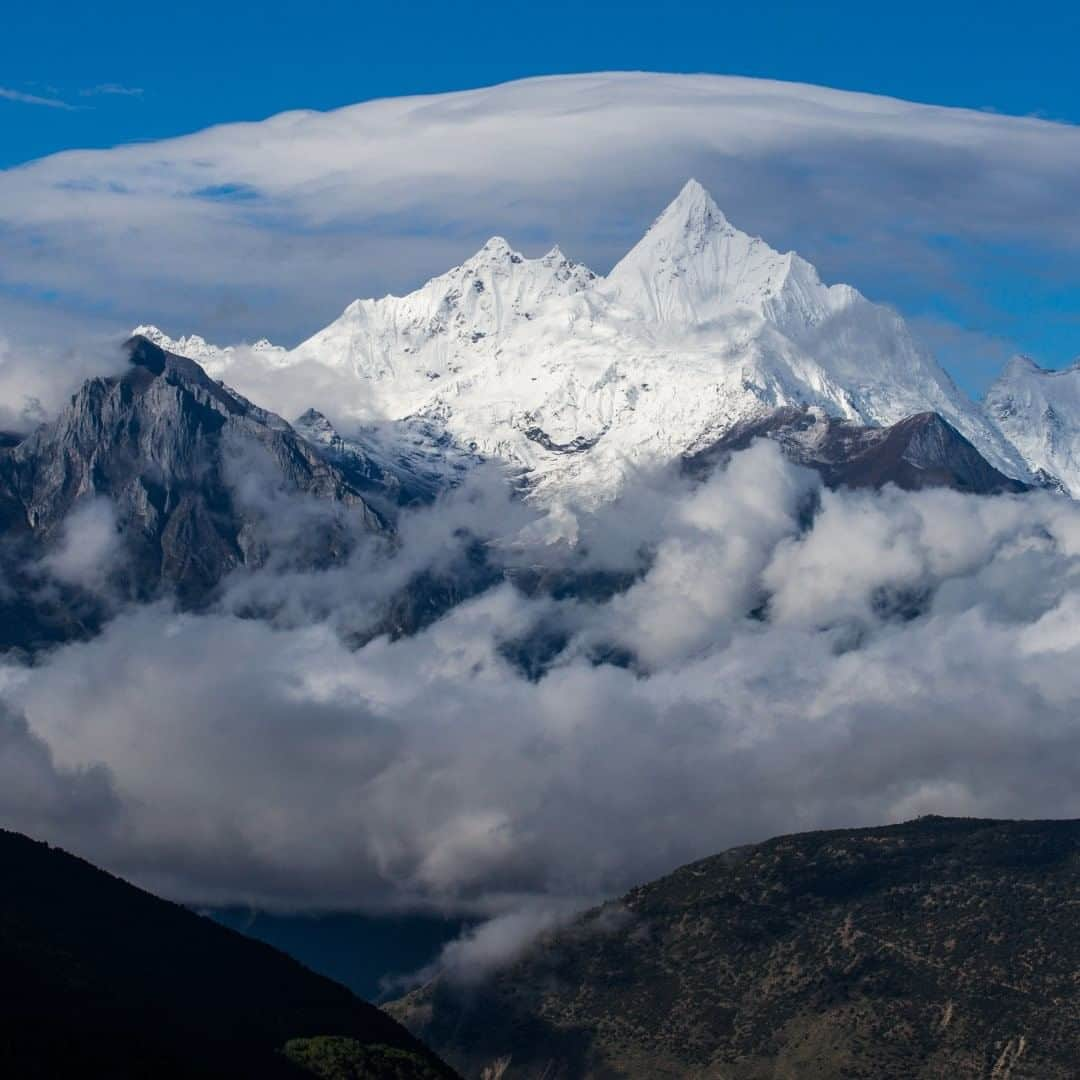 National Geographic Travelさんのインスタグラム写真 - (National Geographic TravelInstagram)「Photo by Michael Yamashita @yamashitaphoto  Part of the Meili Snow Mountain range, Kawagebo Peak is Yunnan's highest and most sacred peak for Tibetans. Though five attempts have been made, it has never successfully been climbed, and several people have died trying. In 2001 a law was passed banning any future attempts for religious reasons. Tibetans believe disaster will follow if humans set foot on its peak. They worship Kawagarbo, the god who resides there, by circumambulating the mountain during an arduous two-week, 150-mile trek. #yunnan #china #Kawagebo #Kawagarbo」7月23日 21時07分 - natgeotravel